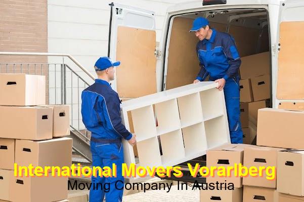 Vorarlberg international movers loading a vehicle for the road route to Austria