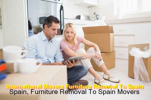Movers preparing furniture for transport to Spain