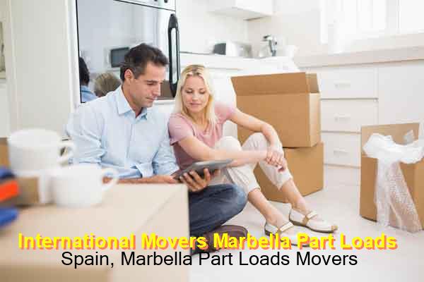 Boxes and furniture items being packed for part load removal from Marbella to UK